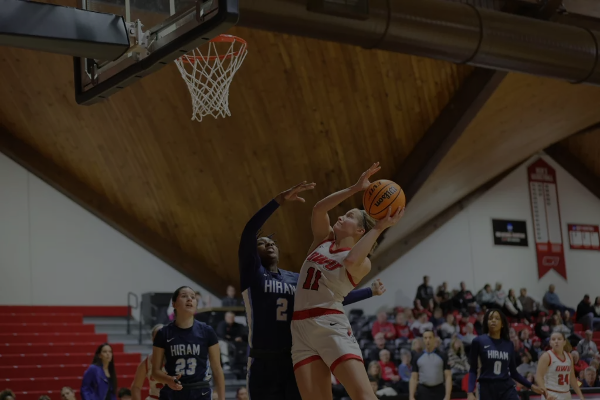 Student playing basketball